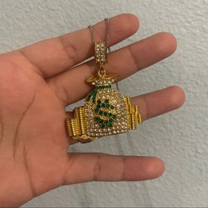 Iced out moneybag pendant